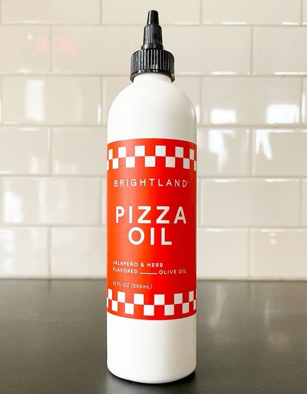 Brightland Pizza Oil a jalapeño and herb flavored extra virgin olive oil in Box